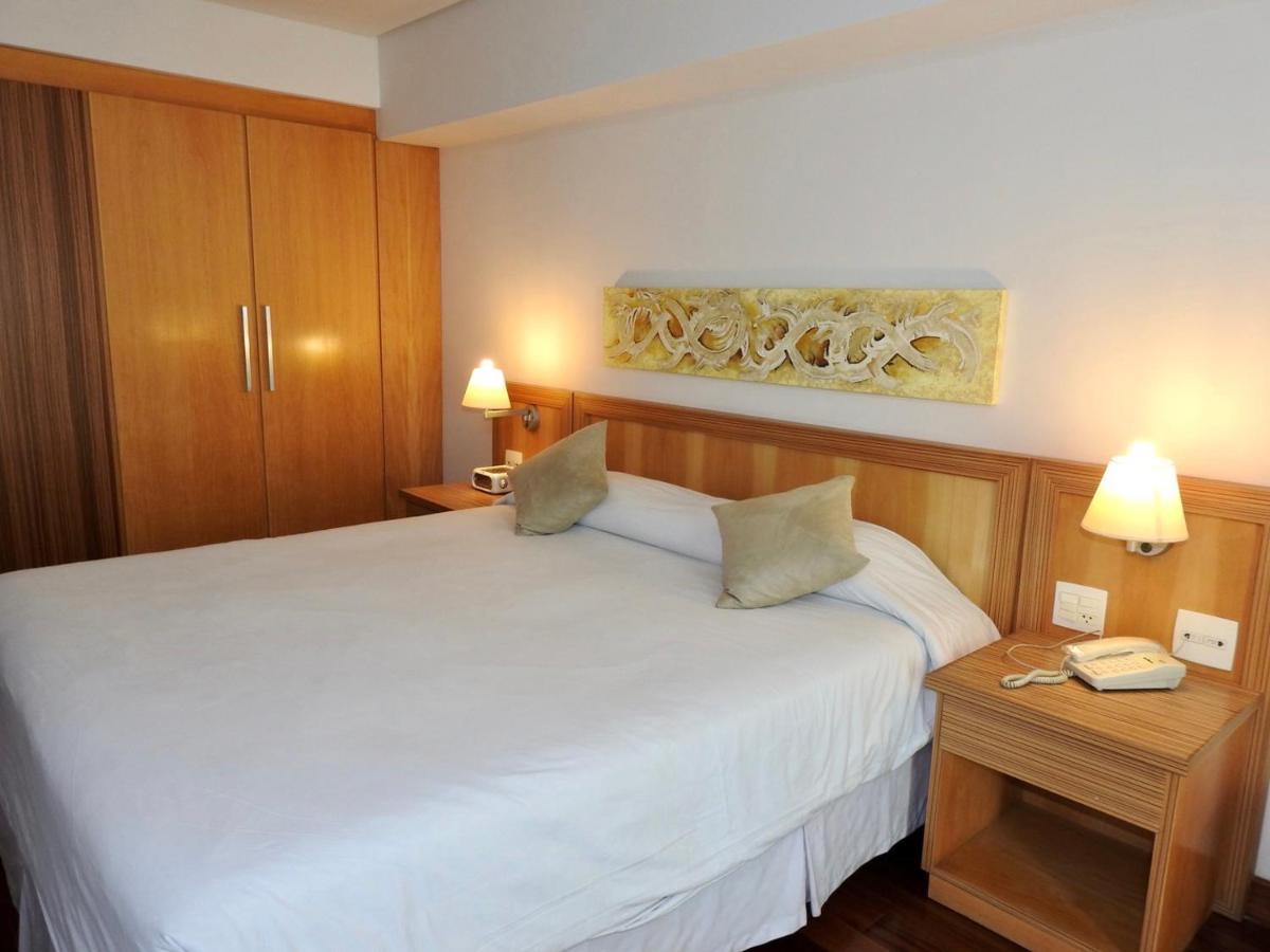 Constantino Hotel E Eventos جويز دي فورا المظهر الخارجي الصورة A bedroom at the hotel