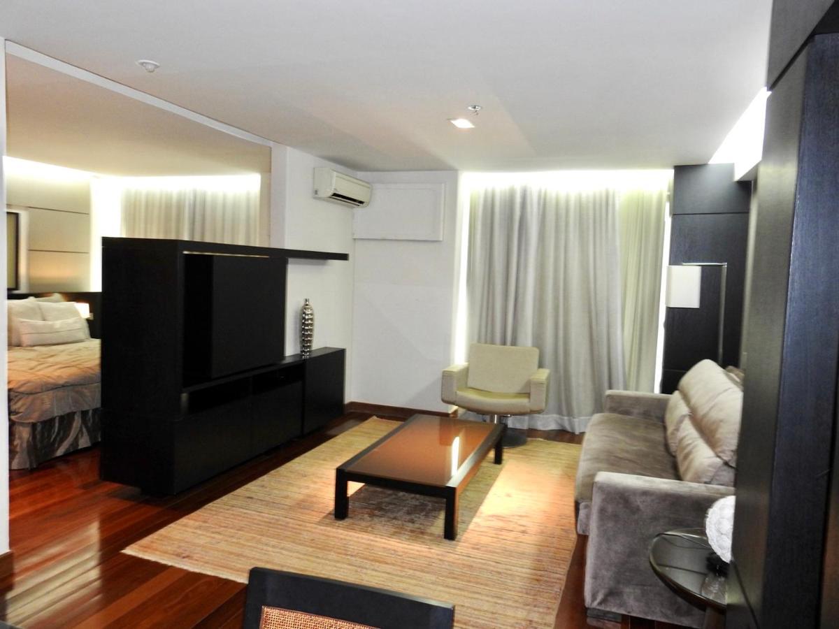 Constantino Hotel E Eventos جويز دي فورا المظهر الخارجي الصورة A living room in a modern apartment