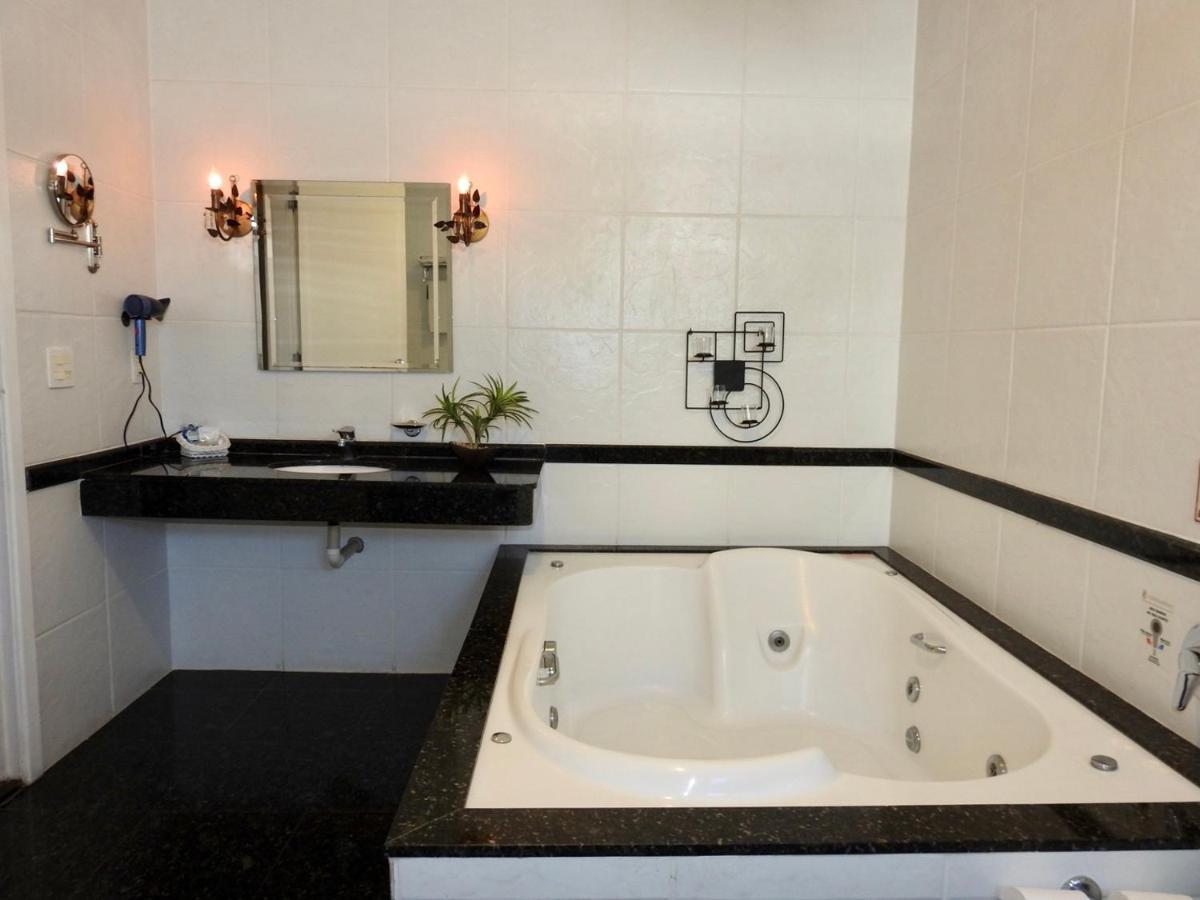 Constantino Hotel E Eventos جويز دي فورا المظهر الخارجي الصورة A whirlpool bathtub