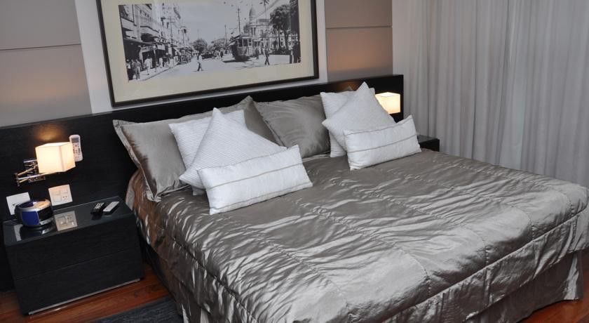 Constantino Hotel E Eventos جويز دي فورا المظهر الخارجي الصورة A bed with a duvet